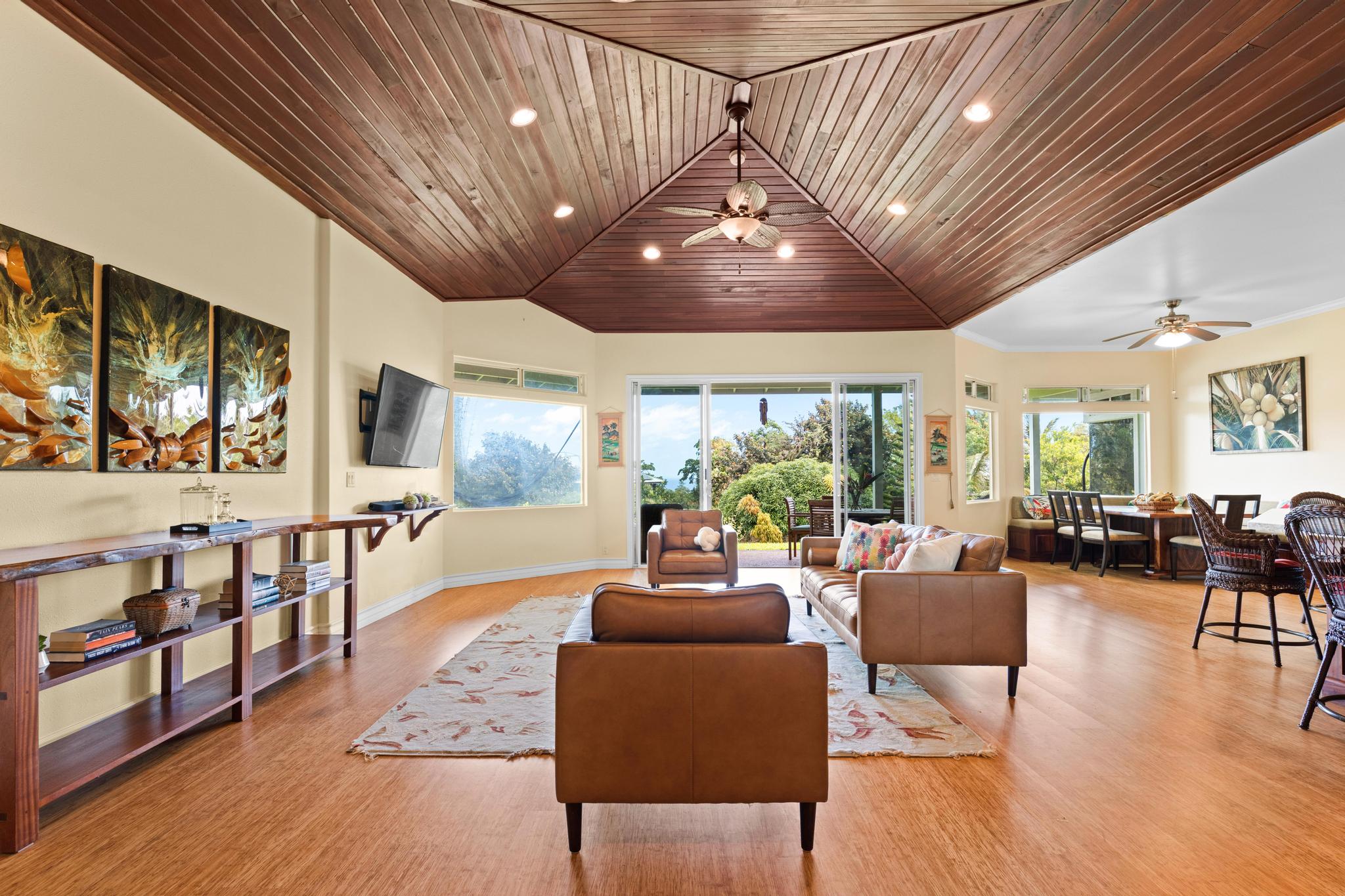 28-256 Akaka Falls Road Honomu, HI 96728 - Photo 28 of 30 a living room with lots of furniture and a large window