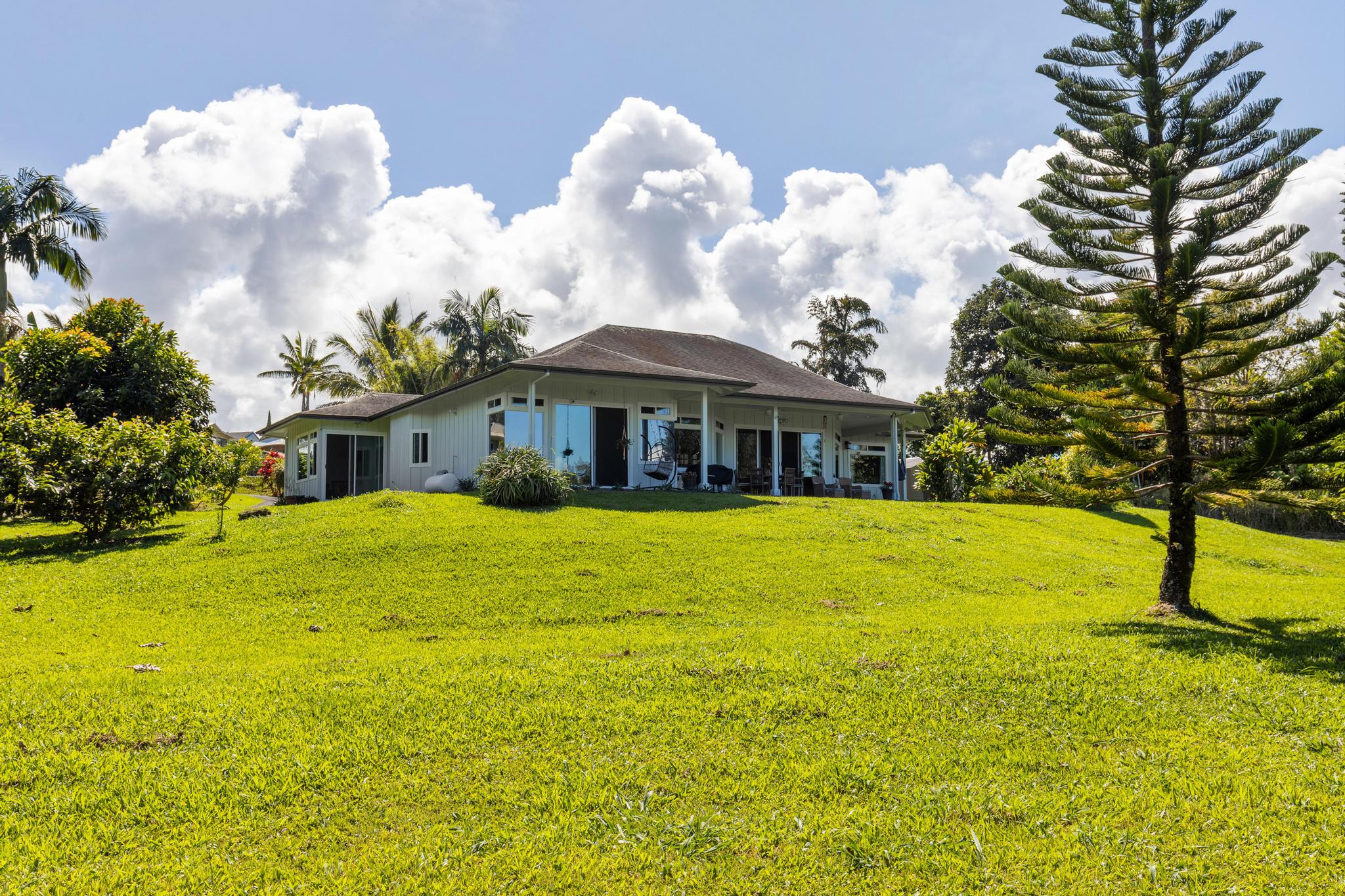 28-256 Akaka Falls Road Honomu, HI 96728 - Photo 30 of 30 a front view of a house with swimming pool