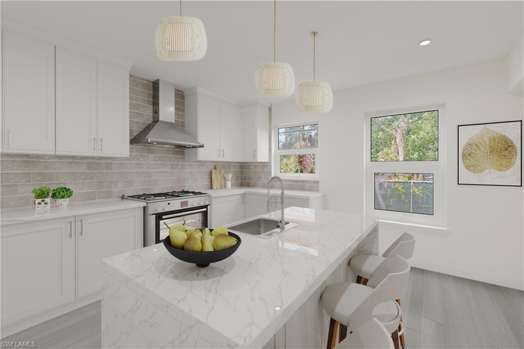 4106 3rd Avenue Southwest Naples, FL 34119 - Photo 36 of 38 Photo includes reality renovation/ staging to showcase the possibility of the guest house kitchen. Design services included with purchase!