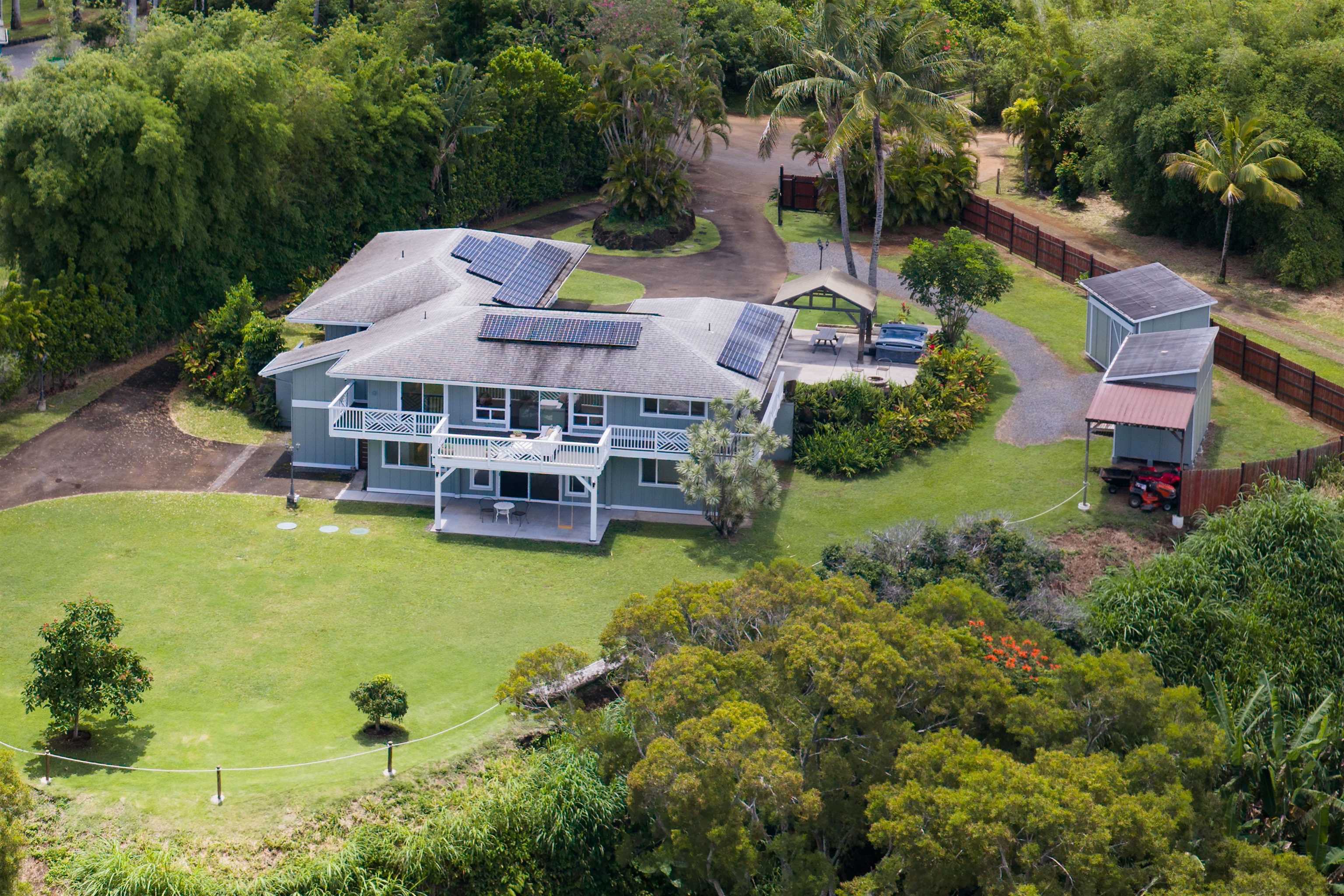 50 Eono Place Haiku, HI 96708 - Photo 8 of 50 an aerial view of a house with a garden and swimming pool