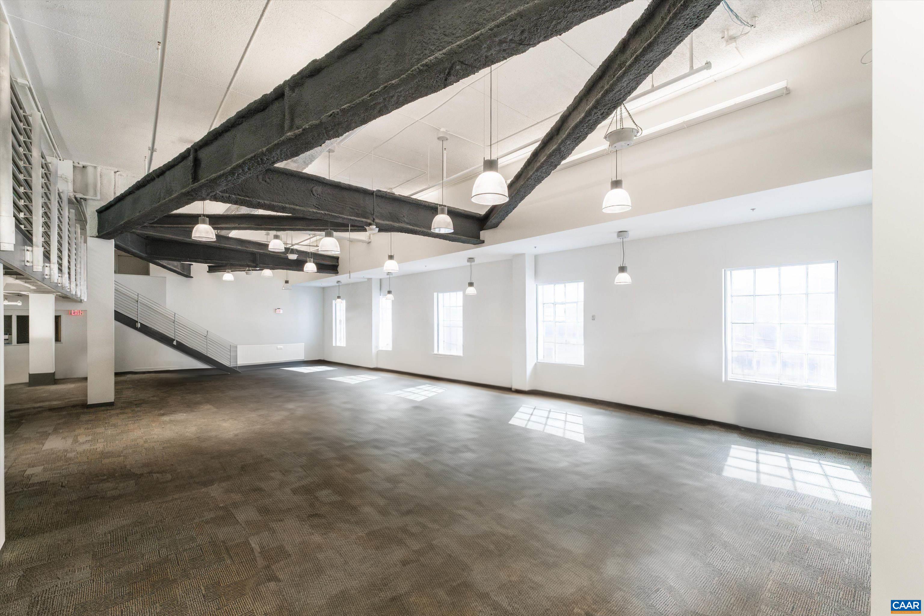 218 West Water Street Charlottesville, VA 22902 - Photo 5 of 16 a view of an empty room with a window