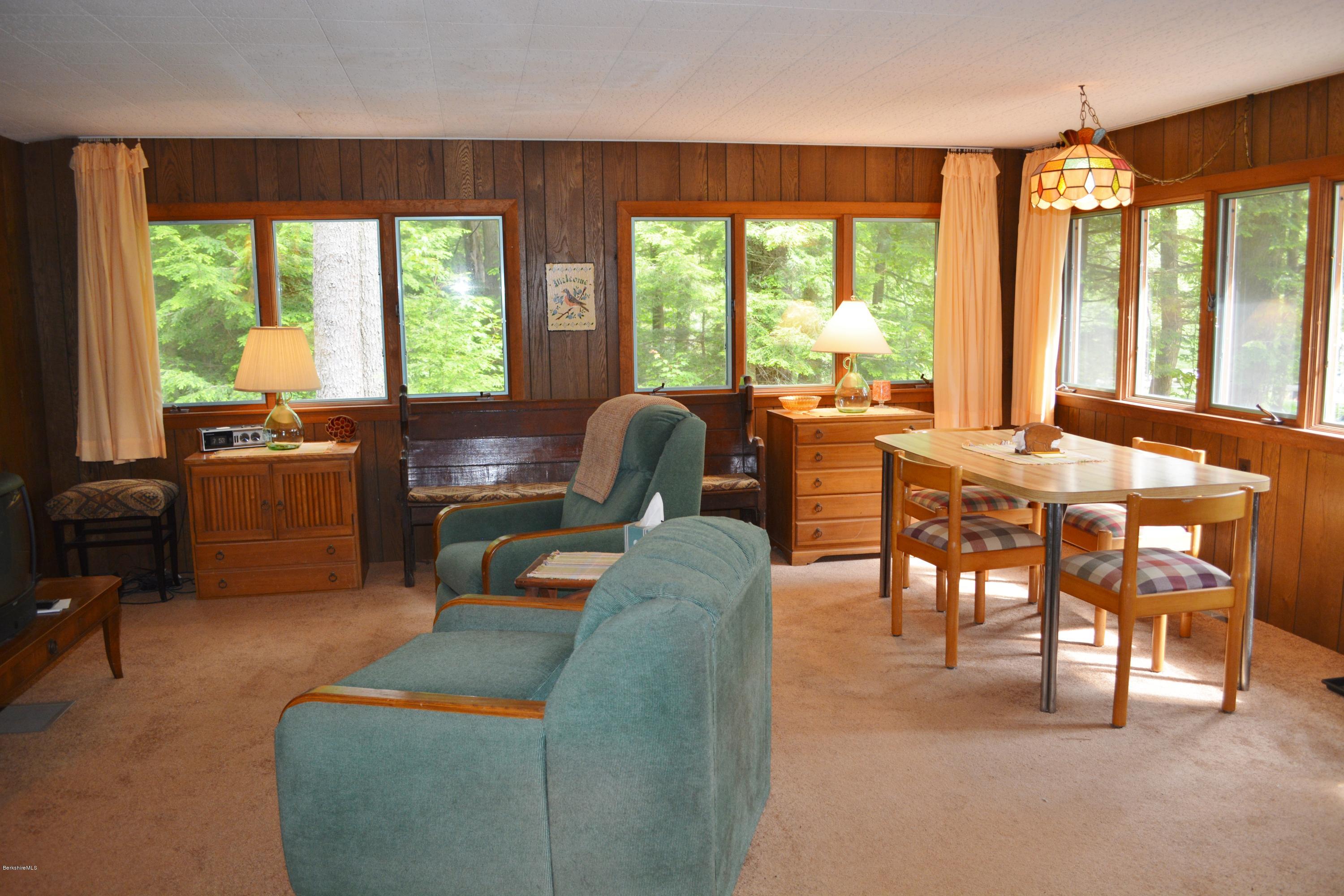 386 Pine Road Otis, MA 01029 - Photo 8 of 12 a living room with furniture and a large window