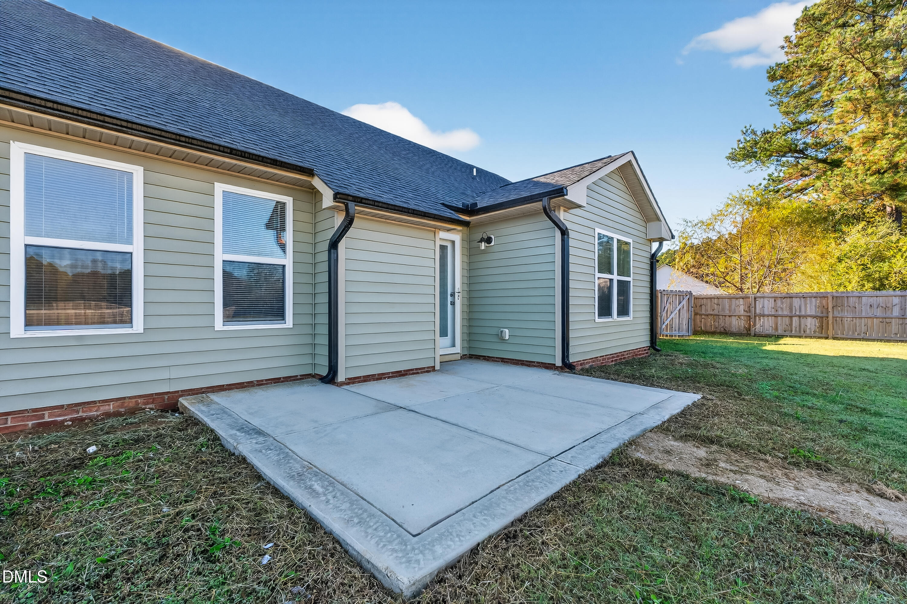 79 Ramble Falls Lane Erwin, NC 28339 - Photo 11 of 46 a view of backyard of house with wooden fence