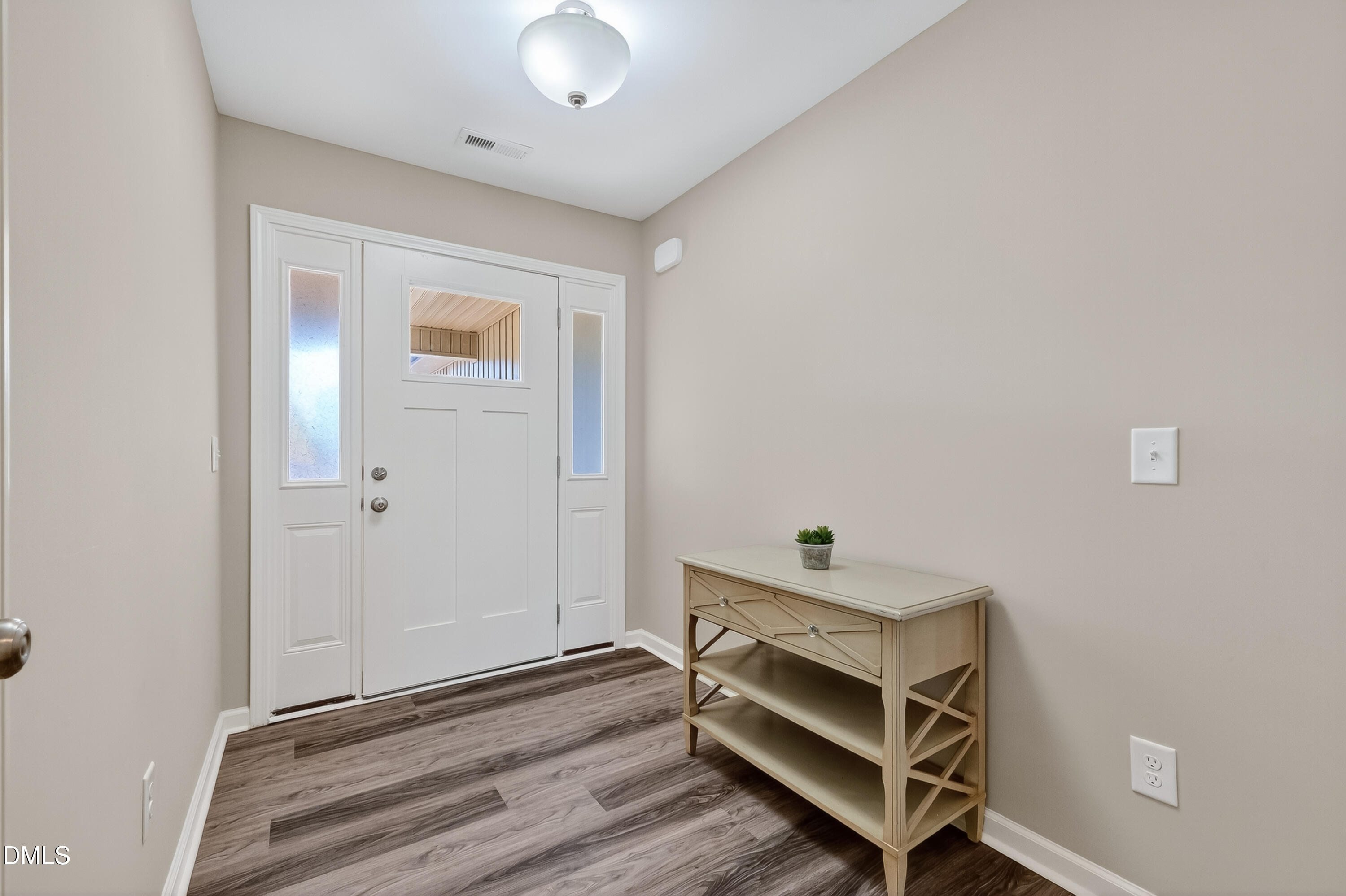 79 Ramble Falls Lane Erwin, NC 28339 - Photo 12 of 46 a room with chair and a window