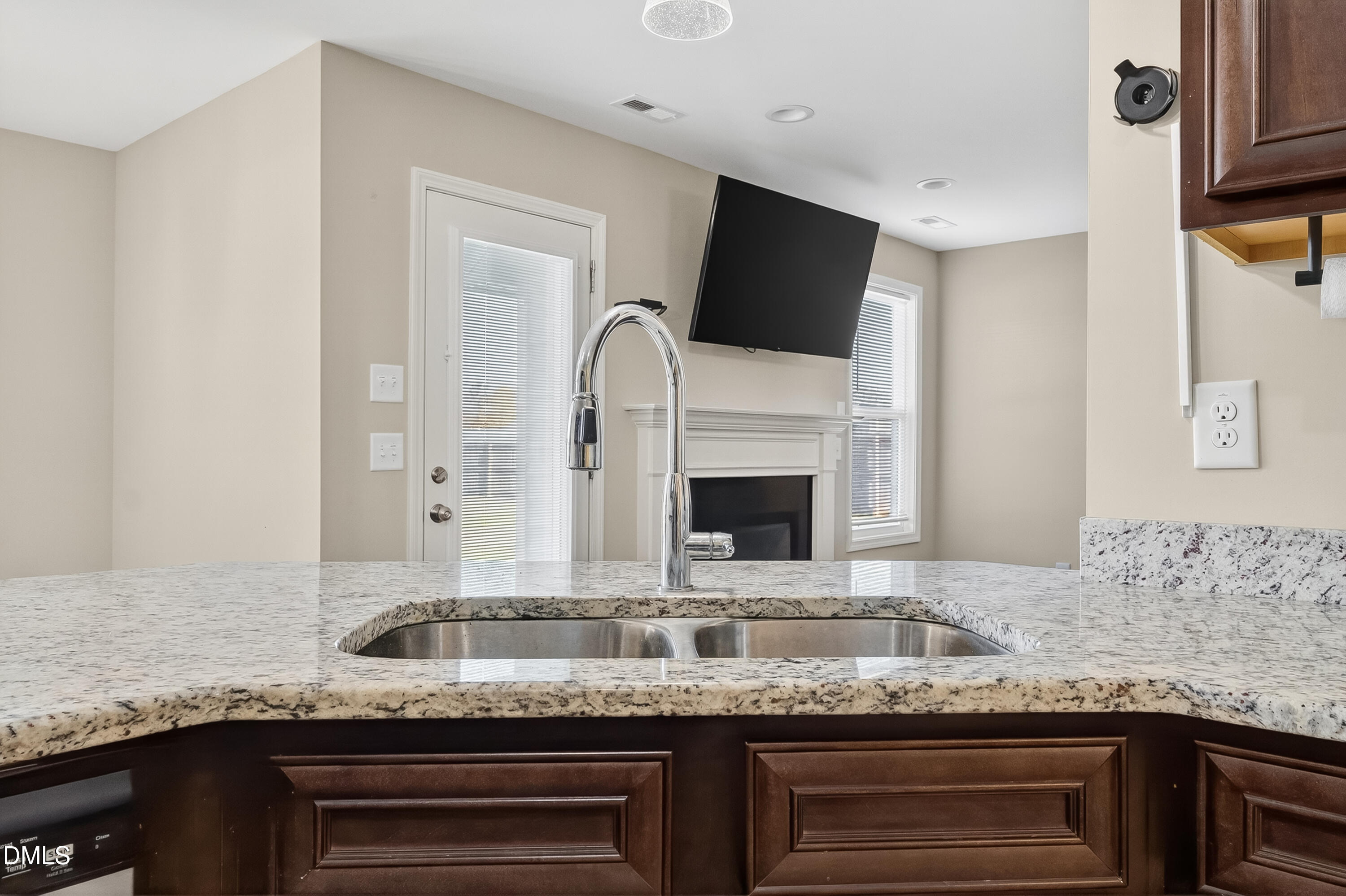 79 Ramble Falls Lane Erwin, NC 28339 - Photo 13 of 46 a kitchen with granite countertop a sink and a stove
