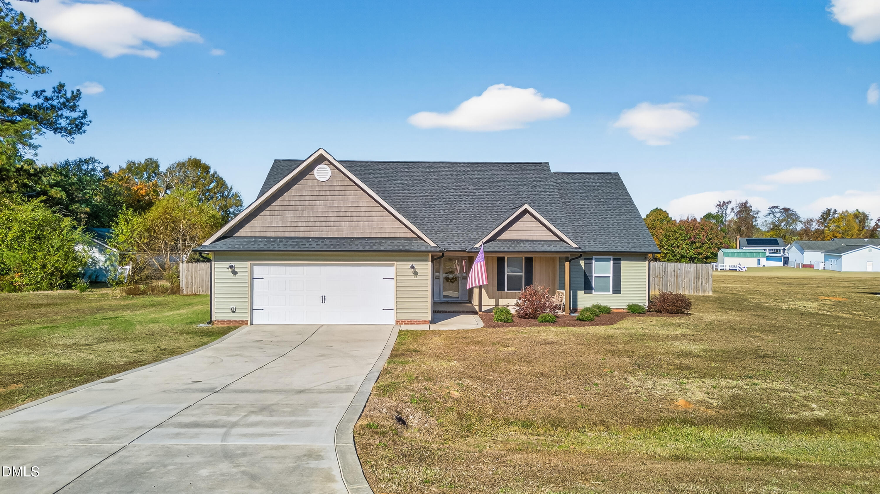 79 Ramble Falls Lane Erwin, NC 28339 - Photo 2 of 46 a front view of a house with a yard