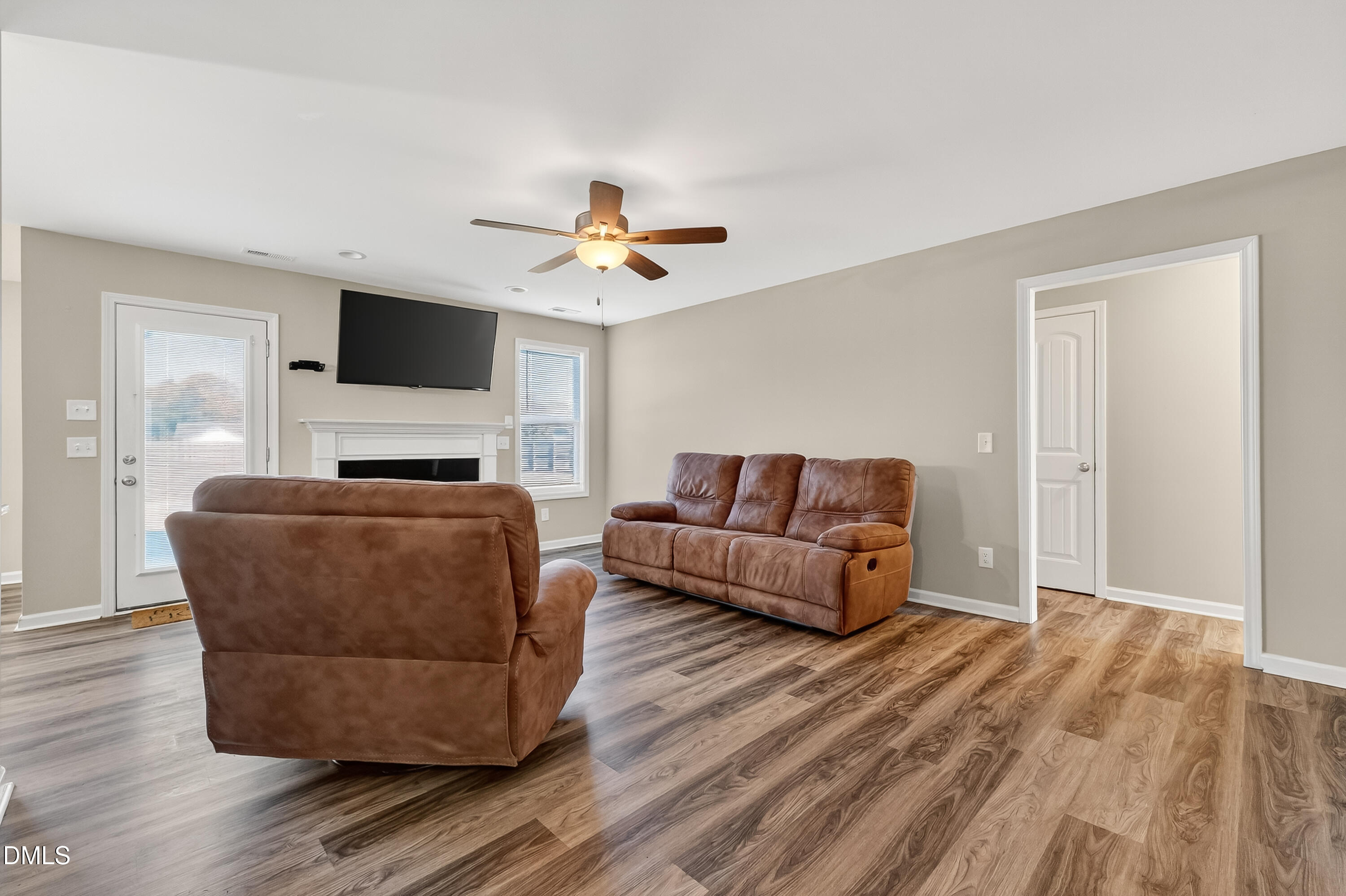 79 Ramble Falls Lane Erwin, NC 28339 - Photo 26 of 46 a living room with furniture and a flat screen tv