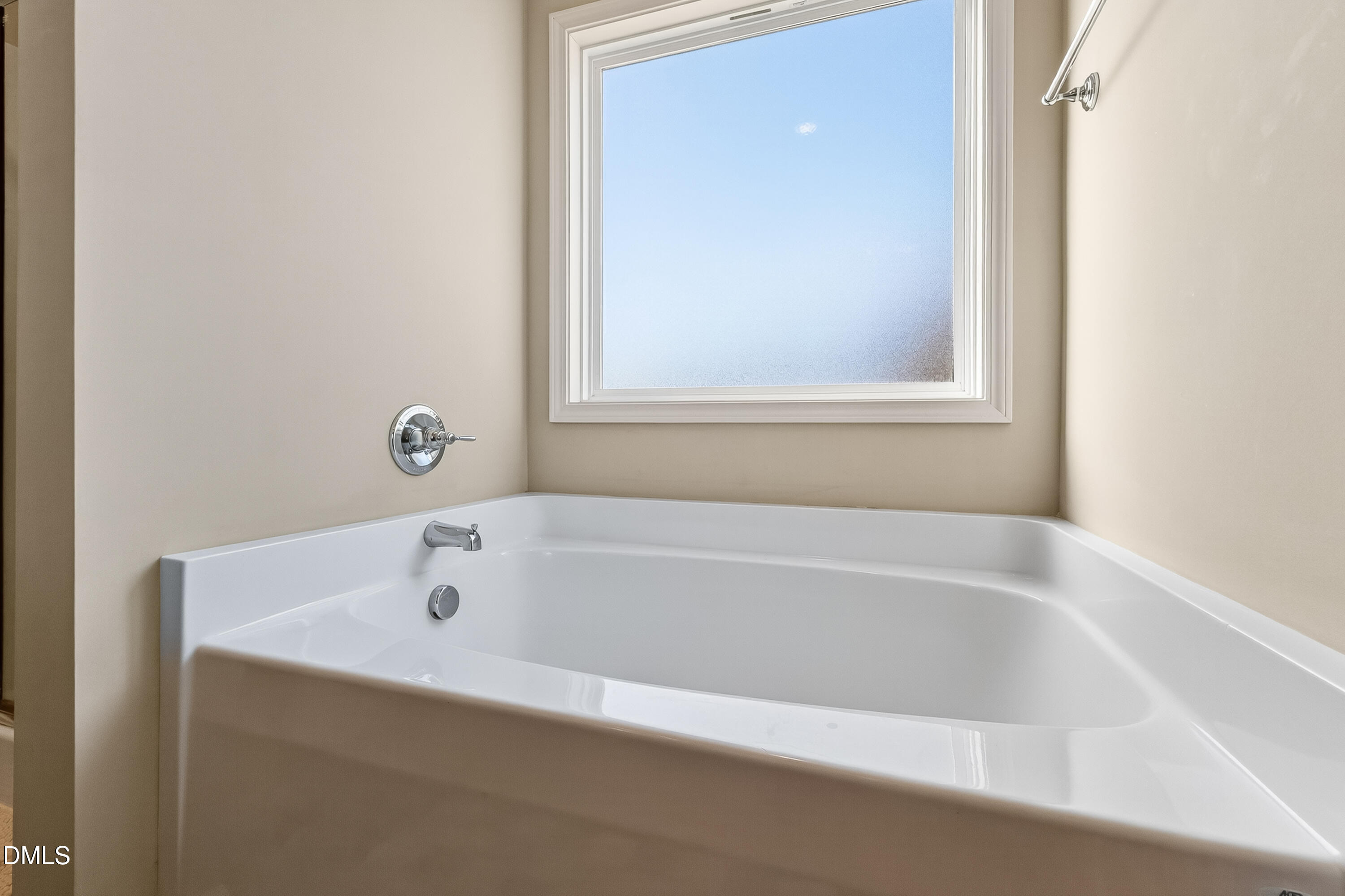 79 Ramble Falls Lane Erwin, NC 28339 - Photo 28 of 46 a white bath tub sitting next to a window