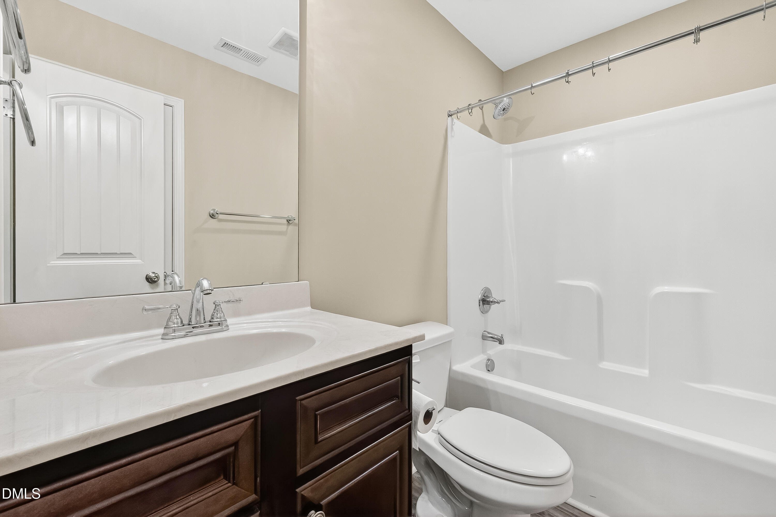 79 Ramble Falls Lane Erwin, NC 28339 - Photo 39 of 46 a bathroom with a sink a toilet and a bathtub