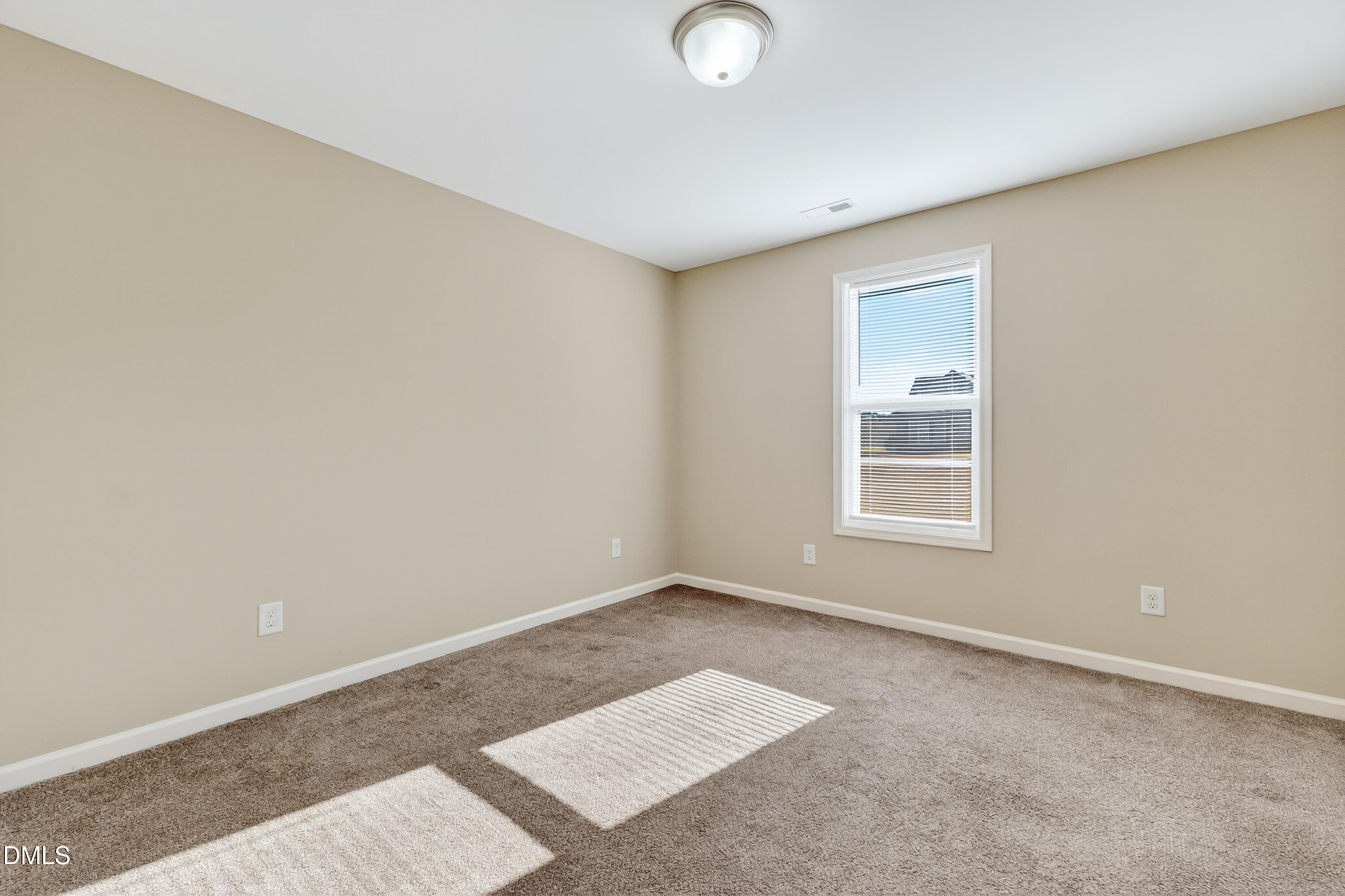 79 Ramble Falls Lane Erwin, NC 28339 - Photo 41 of 46 an empty room with windows