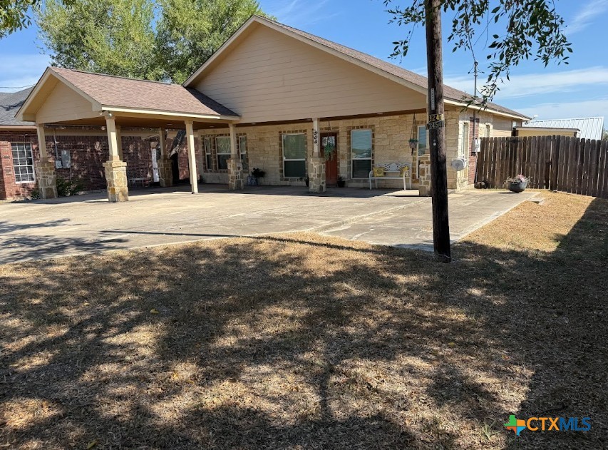 609 Highway 123 Stockdale, TX 78160 - Photo 1 of 26 a view of large residential houses with a yard