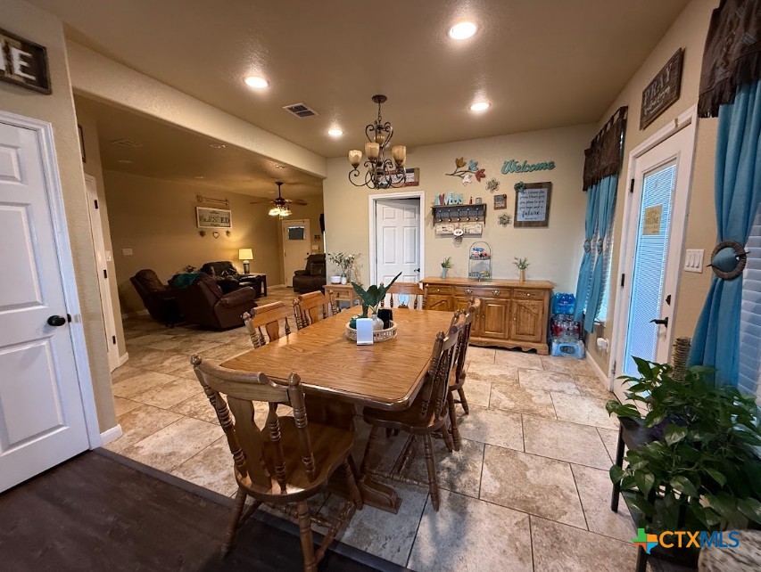 609 Highway 123 Stockdale, TX 78160 - Photo 13 of 26 a view of a dining room with furniture
