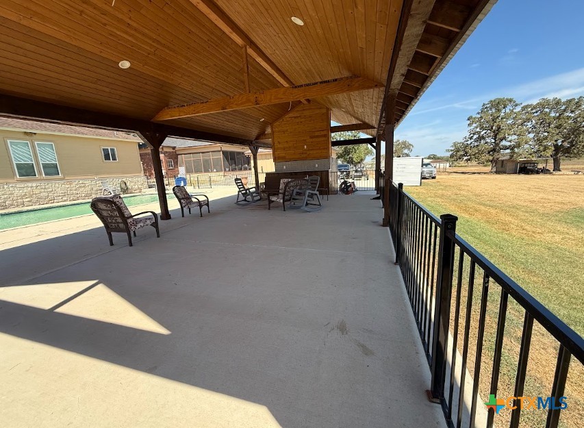 609 Highway 123 Stockdale, TX 78160 - Photo 7 of 26 a view of a patio with table and chairs