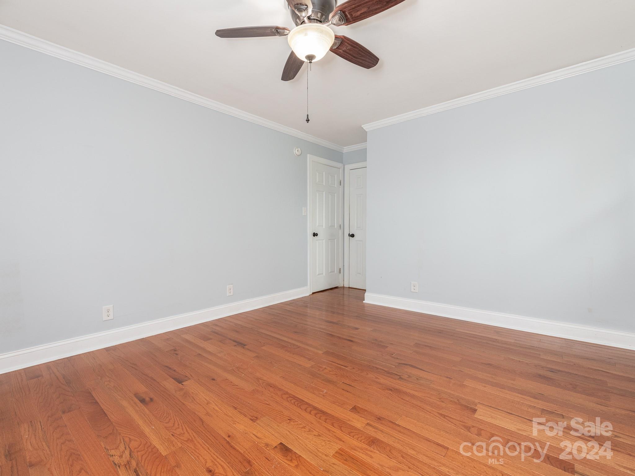 8106 Indian Trail Fairview Road Indian Trail, NC 28079 - Photo 11 of 17 a view of an empty room with wooden floor