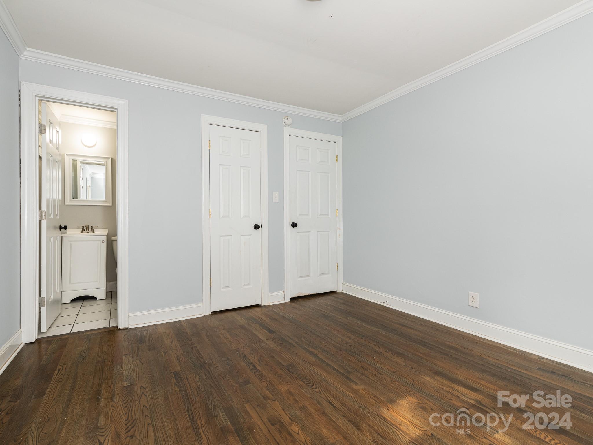 8106 Indian Trail Fairview Road Indian Trail, NC 28079 - Photo 14 of 17 a view of an empty room with wooden floor