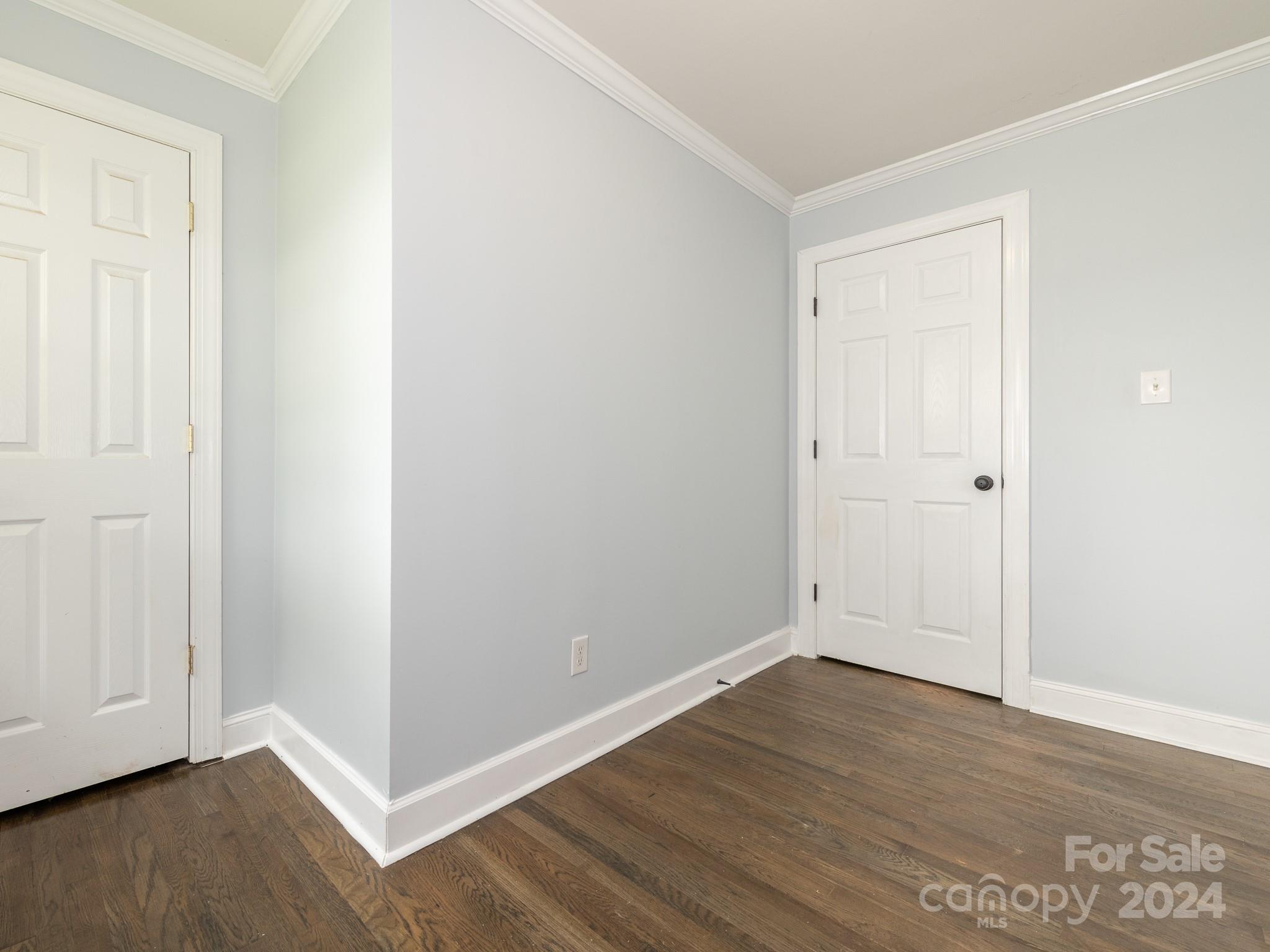 8106 Indian Trail Fairview Road Indian Trail, NC 28079 - Photo 9 of 17 a view of an empty room with wooden floor
