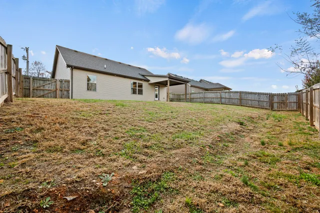 a house view with a outdoor space