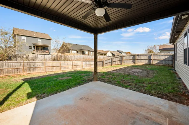 a view of a porch with a big yard