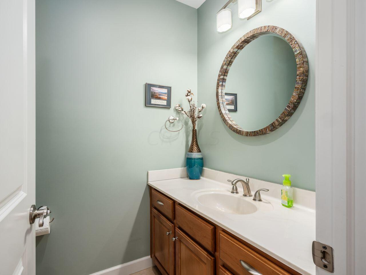 3737 Olentangy River Road Delaware, OH 43015 - Photo 9 of 70 The powder room on the first floor is located near the entrance.