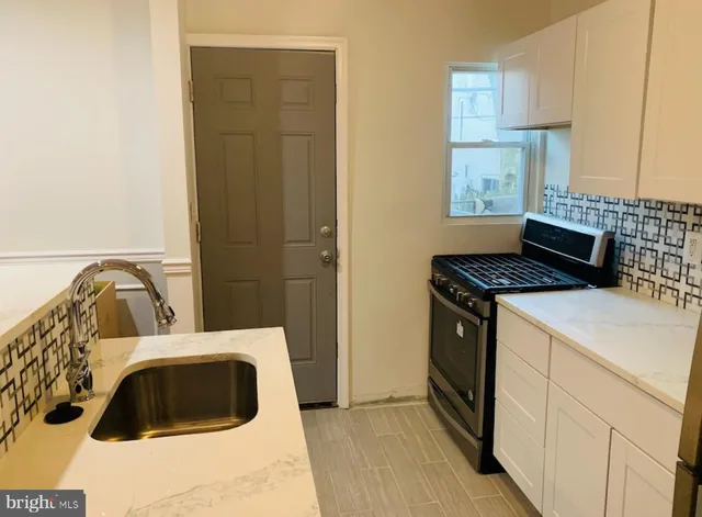 a bedroom with a bed and a cabinets