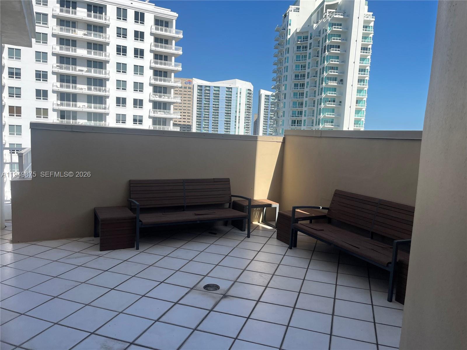 701 Brickell Key Boulevard, Unit PH08 Miami, FL 33131 - Photo 4 of 7 a view of a room with toys and a window