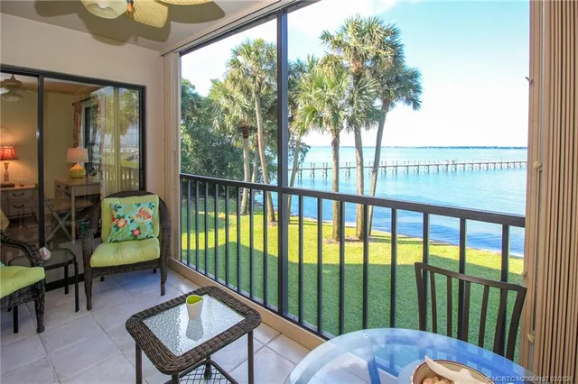 a living room filled with furniture and a table