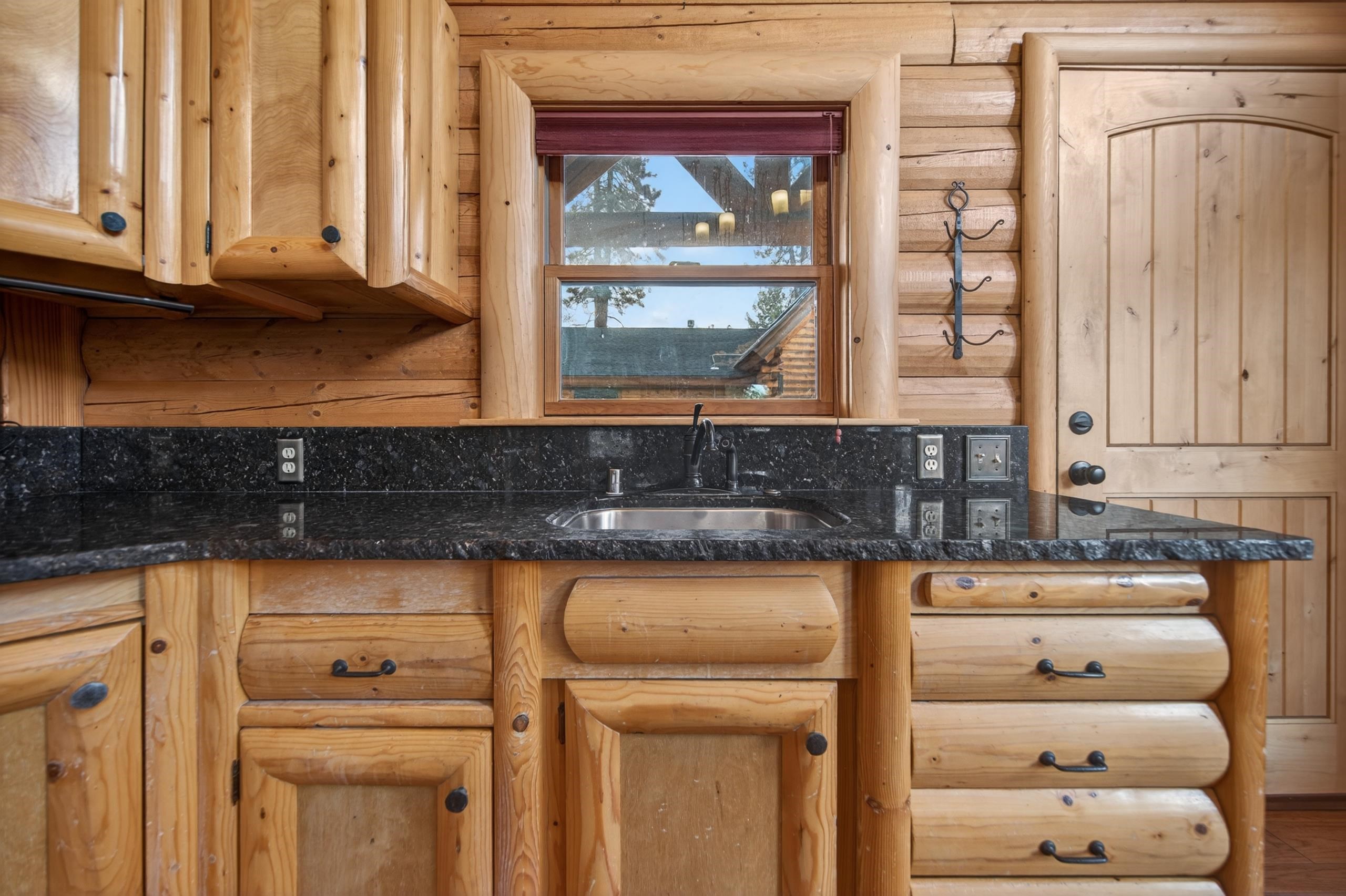 645 Main Street Chester, CA 96020 - Photo 31 of 43 a kitchen with a cabinets and a stove