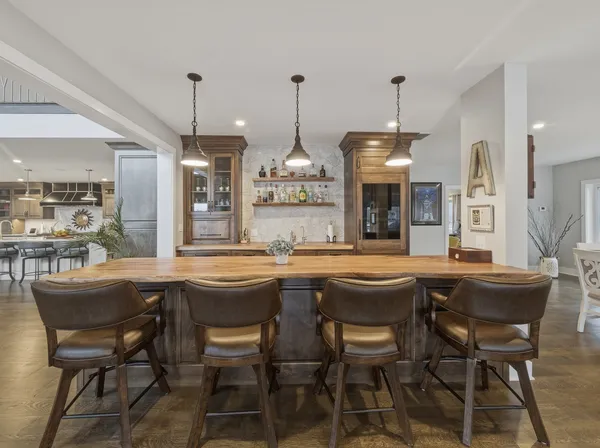 a spacious bedroom with two beds and a couch