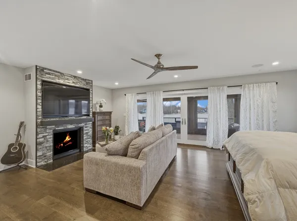 a view of a livingroom with wooden floor