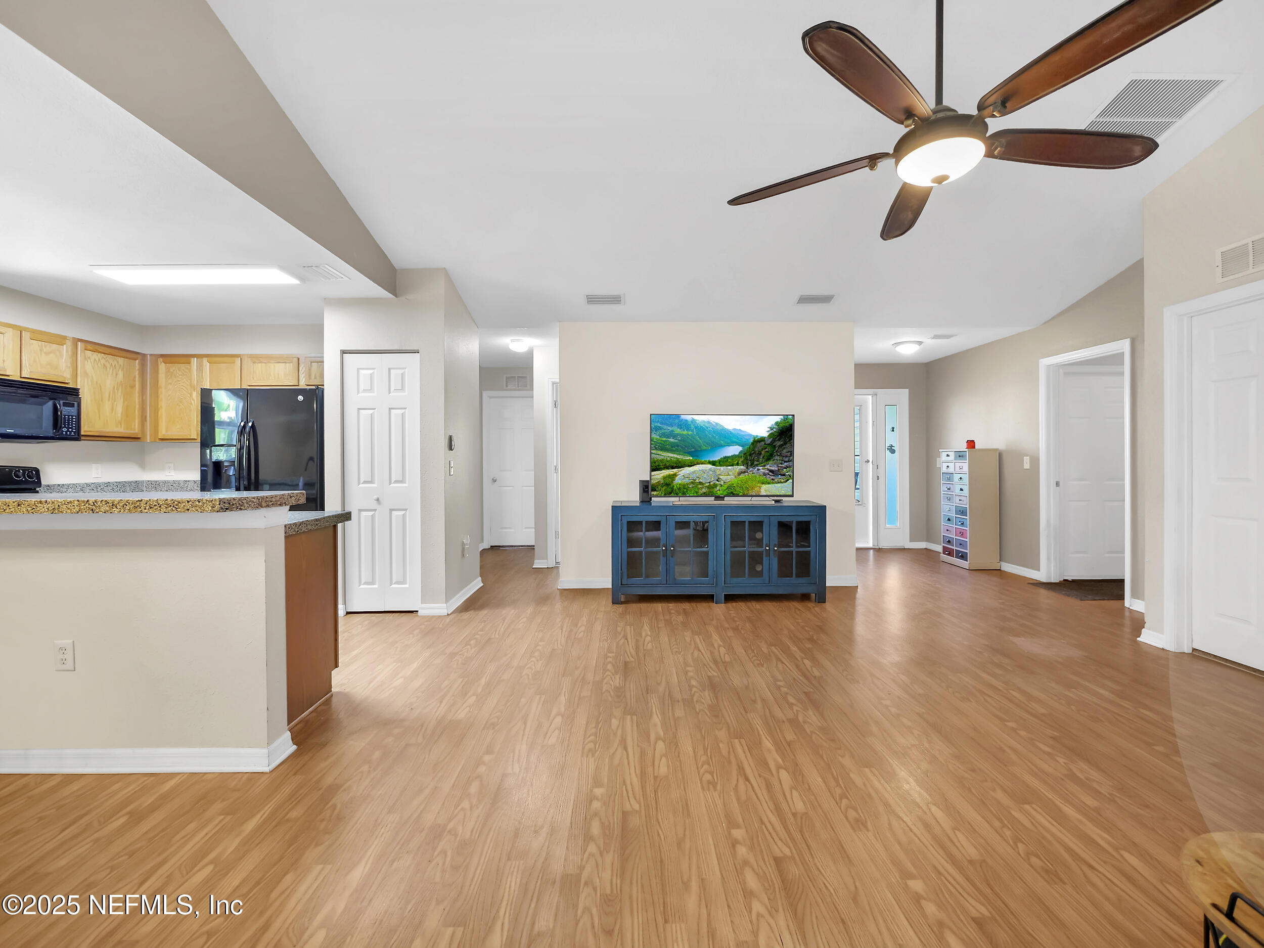 1193 4 Mile Road St. Augustine, FL 32084 - Photo 16 of 54 a view of kitchen with furniture and wooden floor