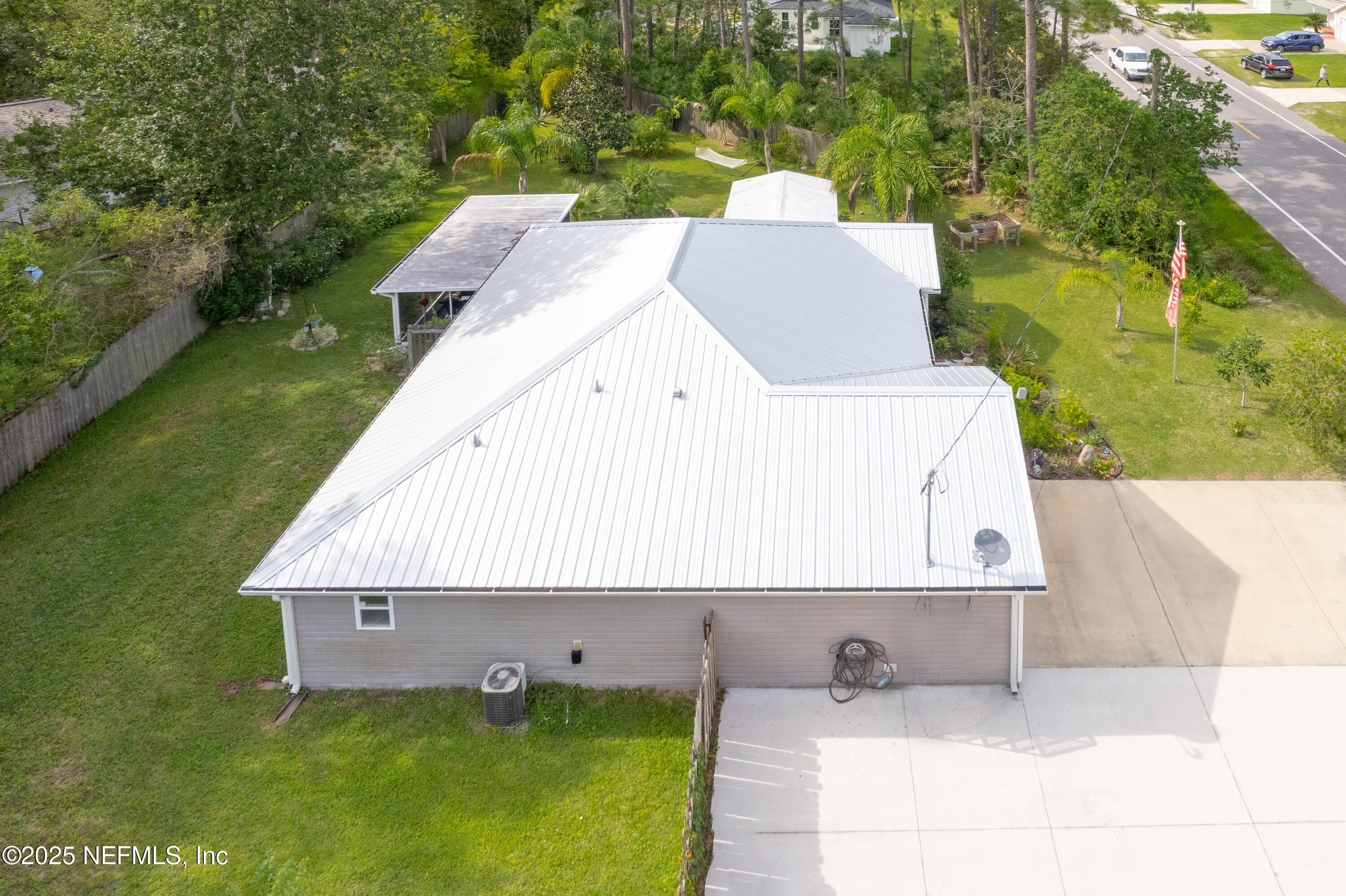 1193 4 Mile Road St. Augustine, FL 32084 - Photo 44 of 54 a view of a house with a backyard