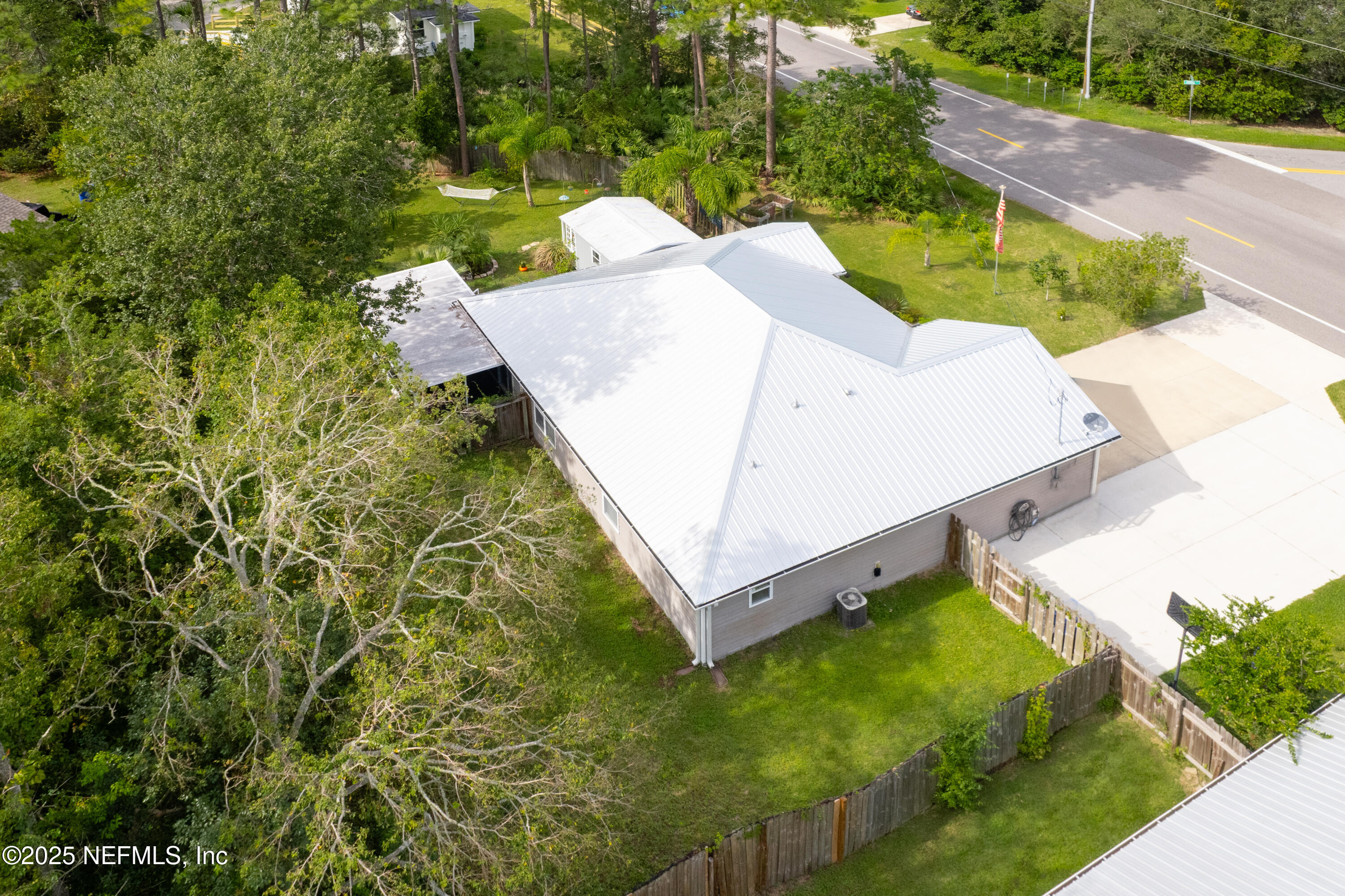 1193 4 Mile Road St. Augustine, FL 32084 - Photo 47 of 54 a view of a yard with an outdoor space