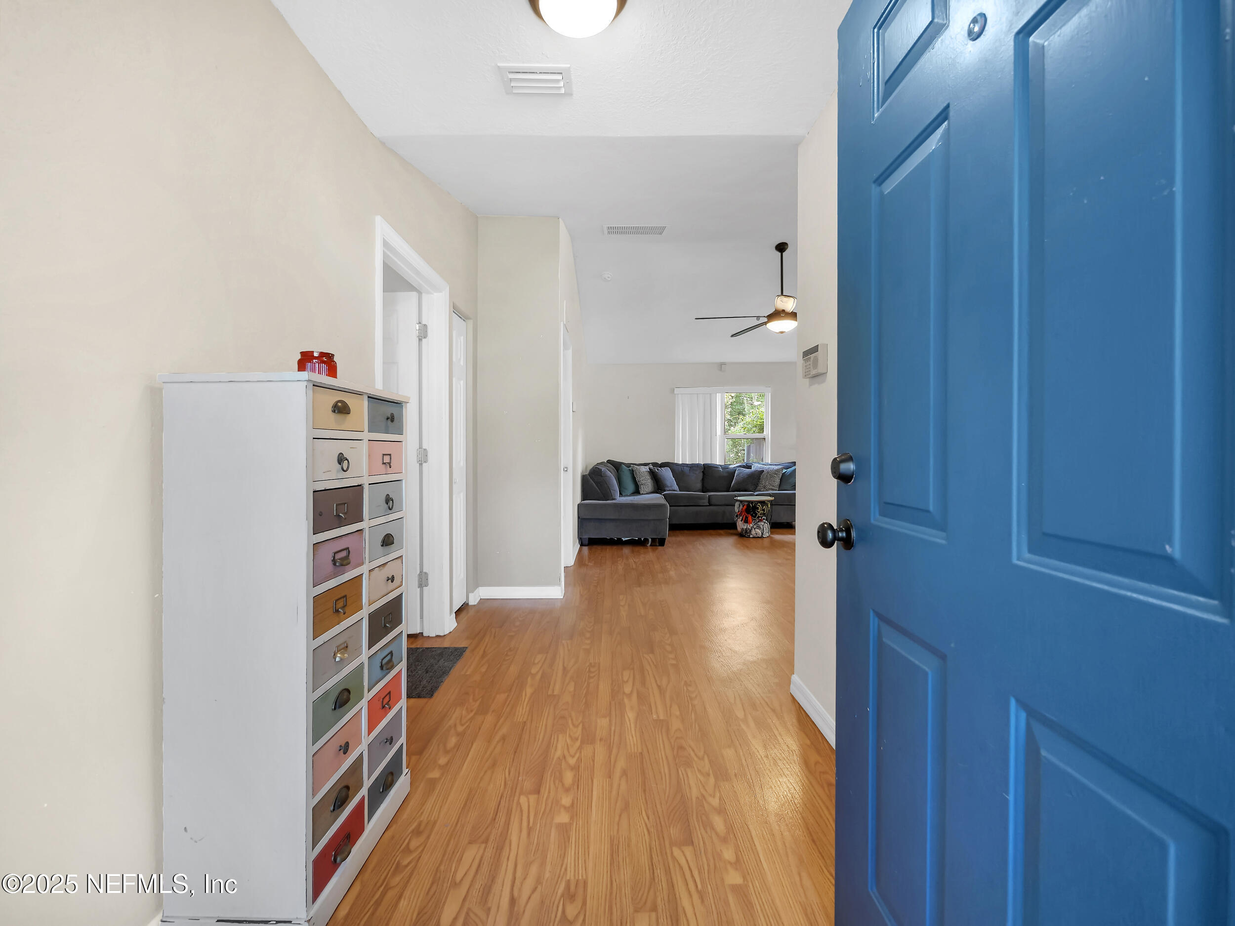 1193 4 Mile Road St. Augustine, FL 32084 - Photo 5 of 54 a view of living room with furniture and wooden floor