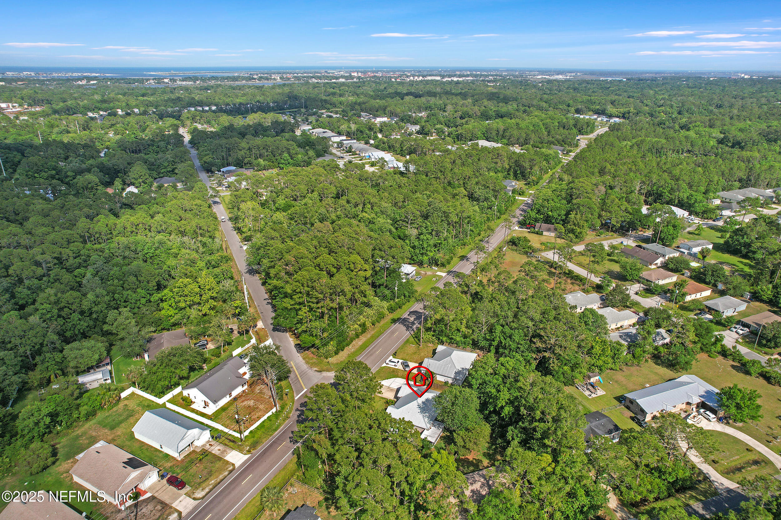 1193 4 Mile Road St. Augustine, FL 32084 - Photo 52 of 54 an aerial view of residential houses with outdoor space and trees