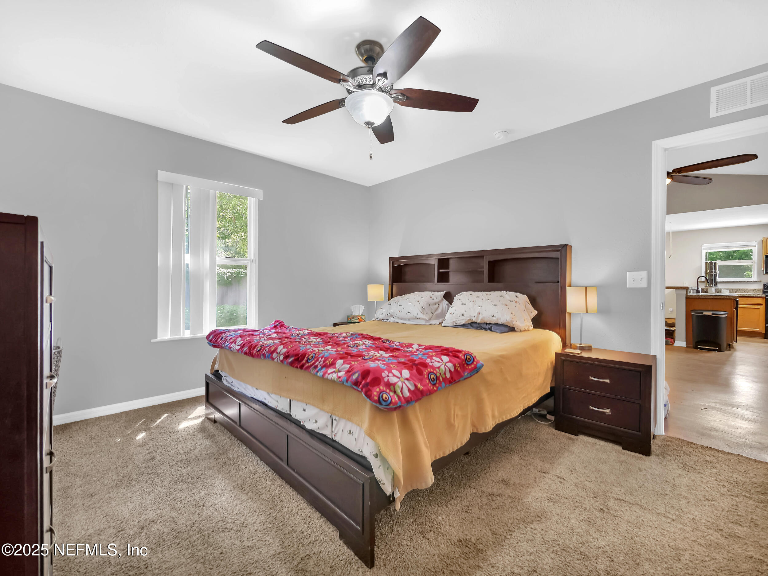 1193 4 Mile Road St. Augustine, FL 32084 - Photo 10 of 54 a bedroom with a bed and window