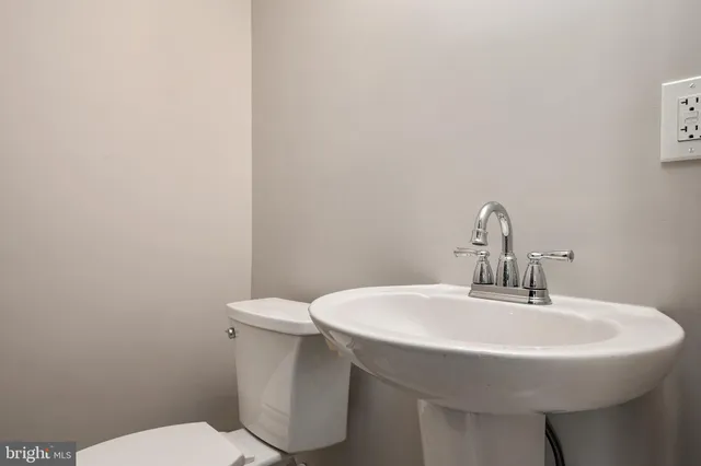 a bathroom with a sink and a toilet