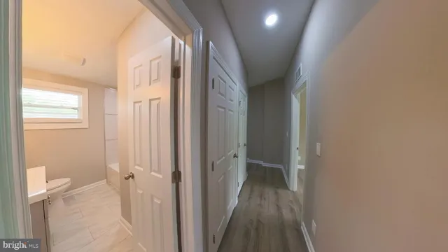 a close view of a utility room with dryer and washer