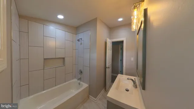 a bathroom with a toilet and shower
