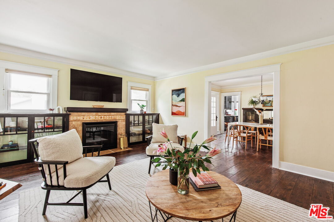 5159 Shearin Avenue Los Angeles, CA 90041 - Photo 12 of 47 a living room with furniture and a flat screen tv