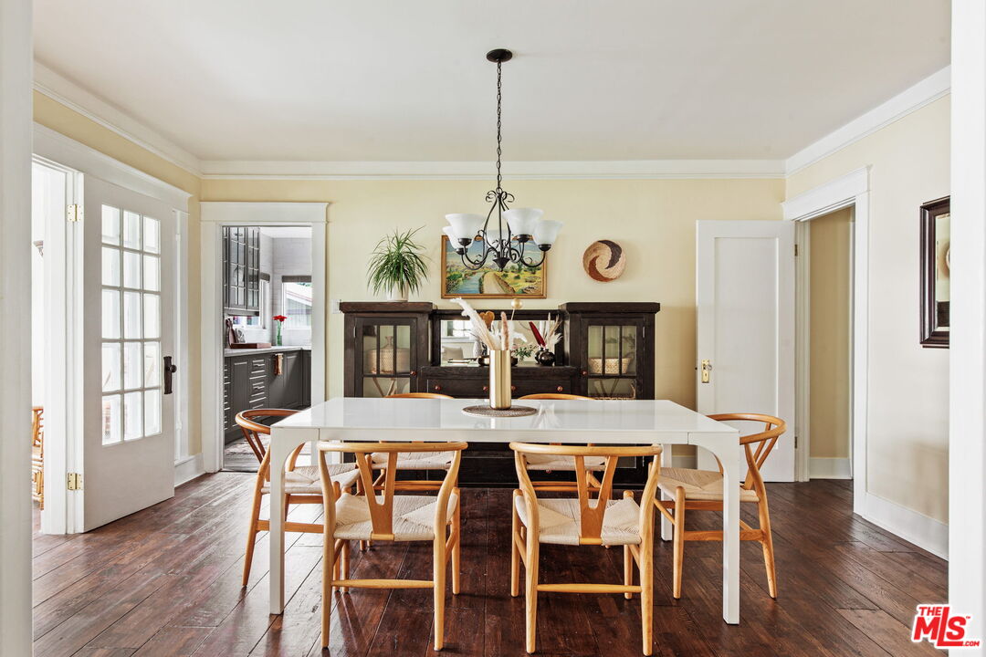 5159 Shearin Avenue Los Angeles, CA 90041 - Photo 14 of 47 a view of a dining room with furniture window and wooden floor