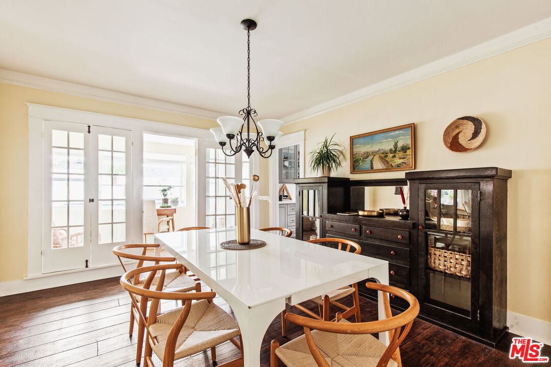 5159 Shearin Avenue Los Angeles, CA 90041 - Photo 16 of 47 a view of a dining room with furniture window and wooden floor
