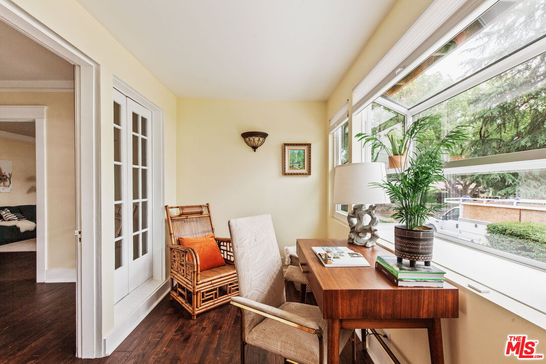 5159 Shearin Avenue Los Angeles, CA 90041 - Photo 17 of 47 a view of a dining room with furniture window and wooden floor