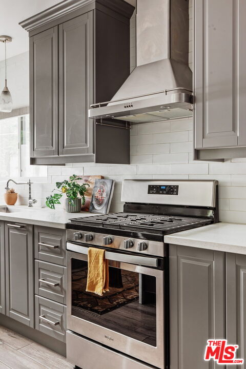 5159 Shearin Avenue Los Angeles, CA 90041 - Photo 21 of 47 a kitchen with stainless steel appliances granite countertop a stove and a sink