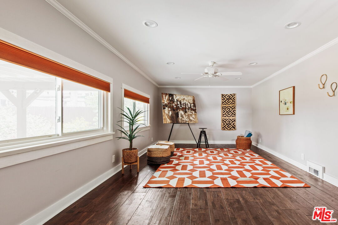 5159 Shearin Avenue Los Angeles, CA 90041 - Photo 27 of 47 a bedroom with a bed and a large window