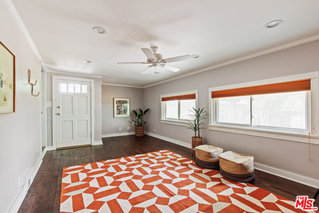 5159 Shearin Avenue Los Angeles, CA 90041 - Photo 28 of 47 a bedroom with a bed and a chandelier
