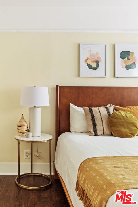 5159 Shearin Avenue Los Angeles, CA 90041 - Photo 35 of 47 a bed sitting in a bedroom and painting on the wall