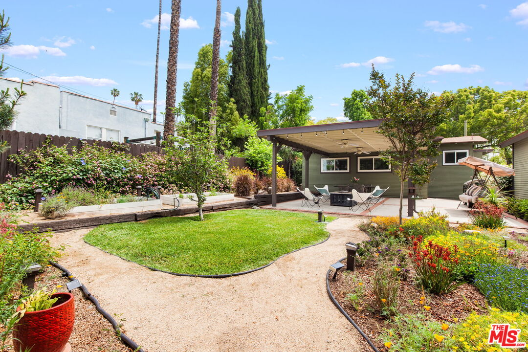 5159 Shearin Avenue Los Angeles, CA 90041 - Photo 42 of 47 a view of a swimming pool with a patio