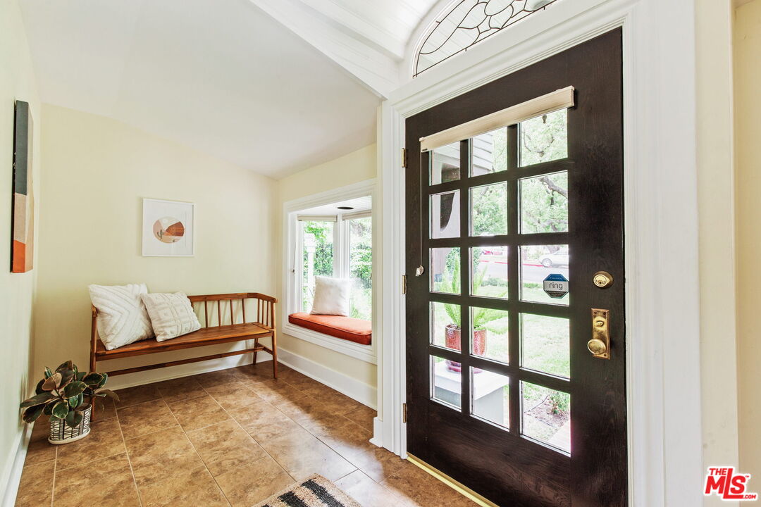 5159 Shearin Avenue Los Angeles, CA 90041 - Photo 6 of 47 a living room with furniture and a window