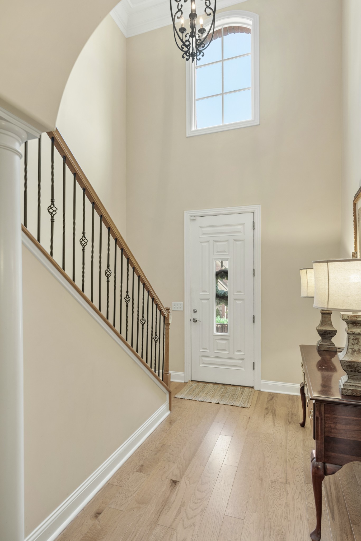 114 Nickolas Circle Lebanon, TN 37087 - Photo 7 of 53 a view of a hallway with entryway wooden floor and front door
