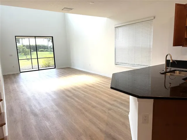 a view of a livingroom with a workspace